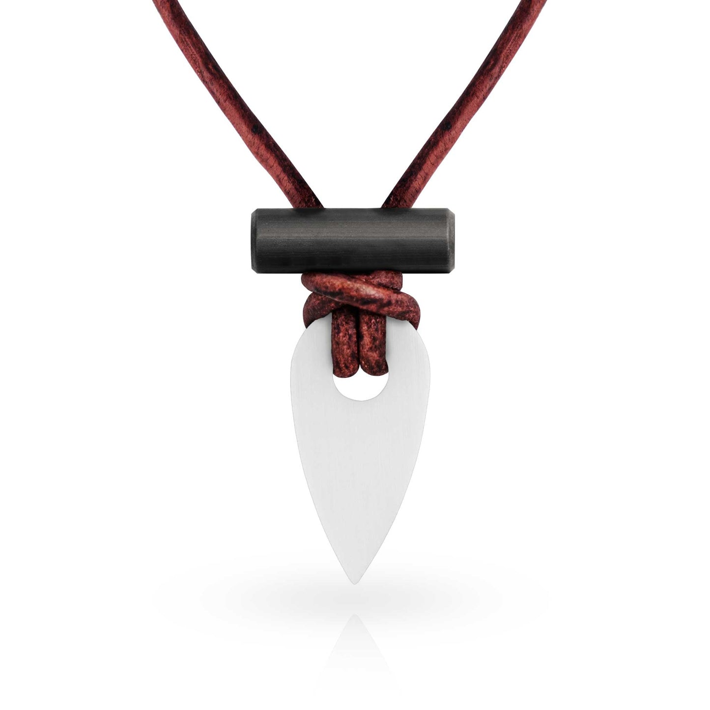 Necklace with a white pendant and black accent on a red cord against a white background