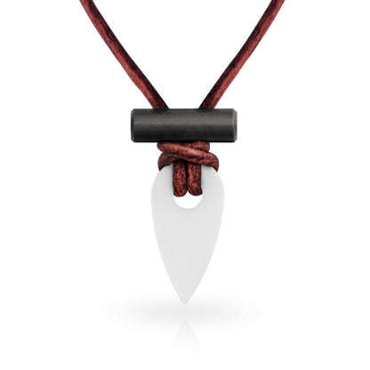 Necklace with a white pendant and black accent on a red cord against a white background